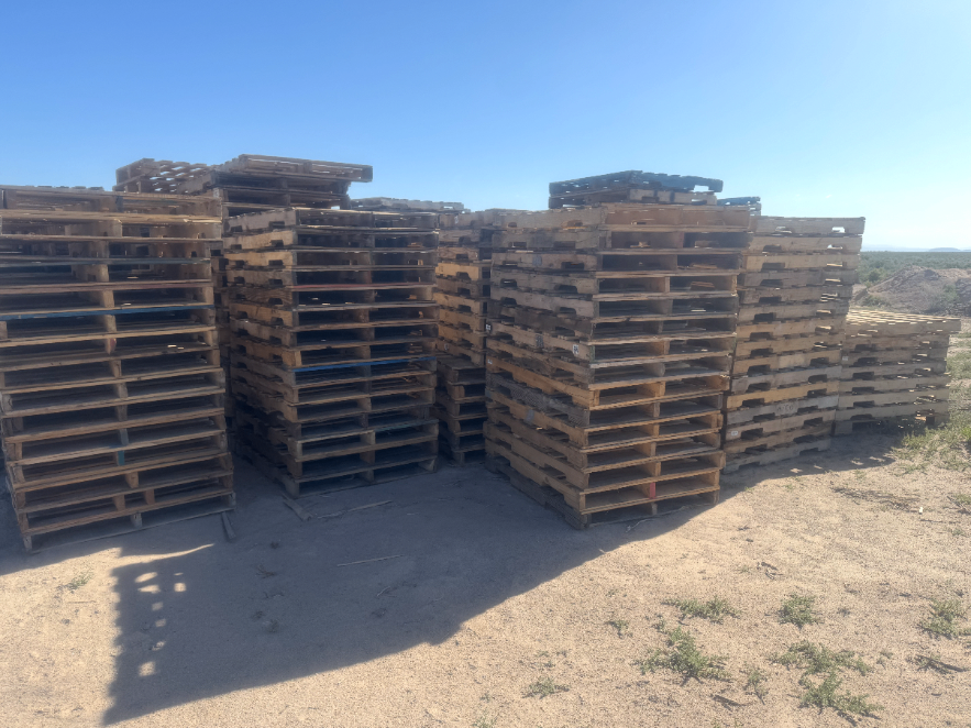 Rows of pallets stacked across the GotWoodPalletCo yard